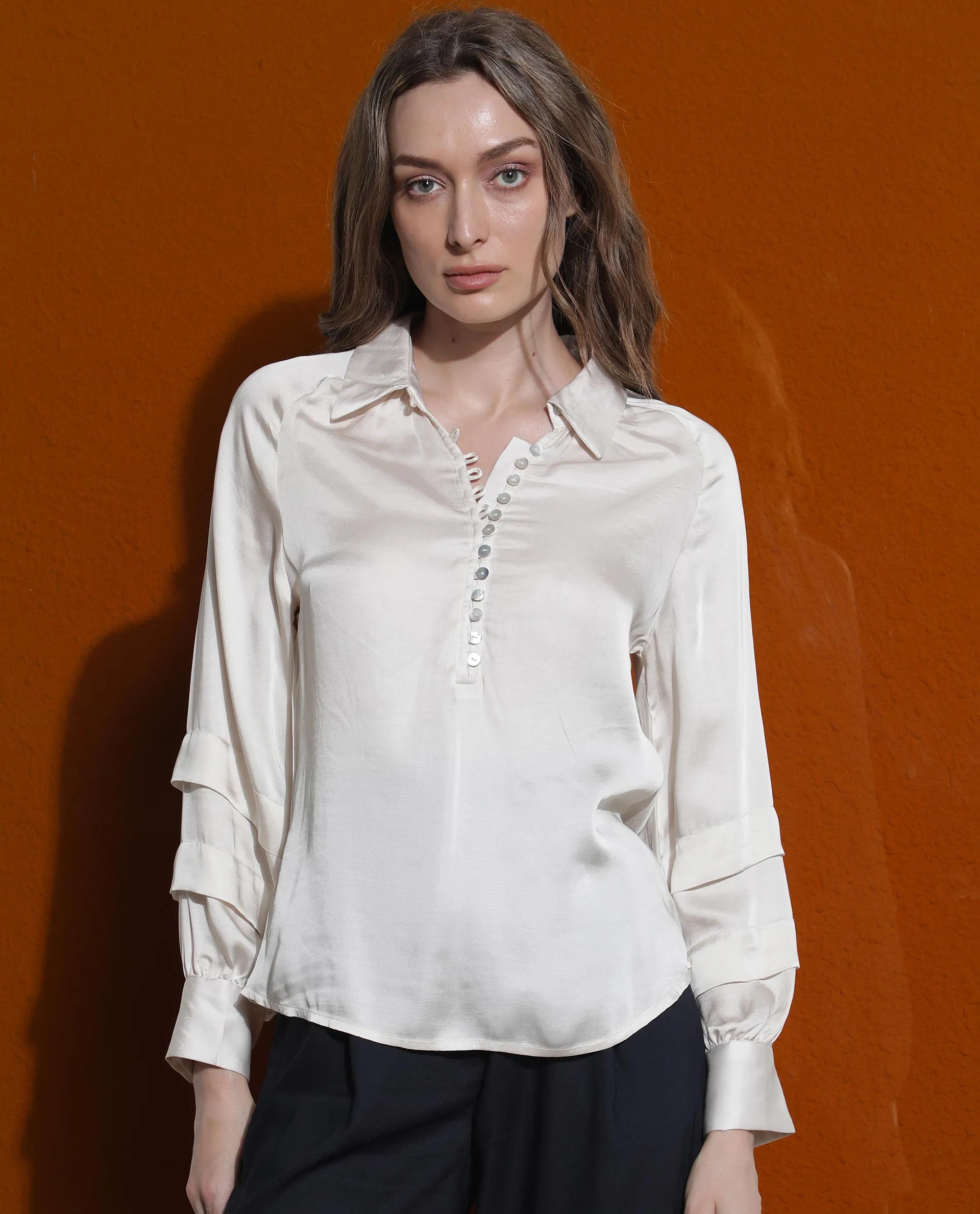 Rareism Women Renee Beige Viscose Fabric Full Sleeves Button Closure Shirt Collar Bishop Sleeve Relaxed Fit Plain Asymmetric Top